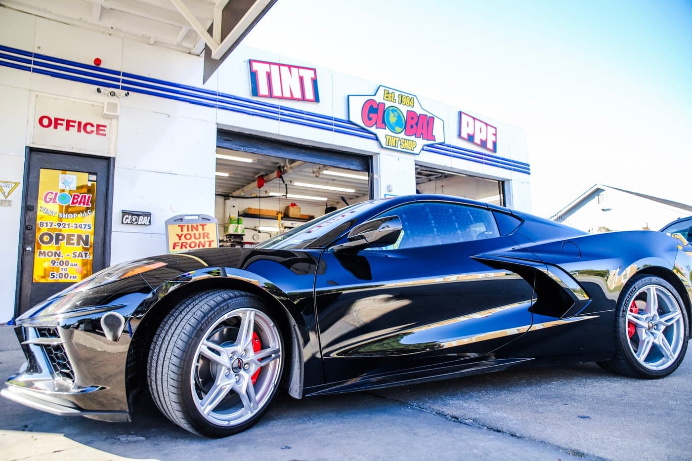 Black Corvette outside the shop on McCart Ave